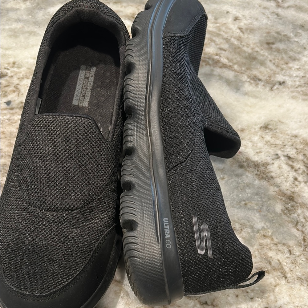 Skechers women Black Slip-On Ultra Go Mesh Sneakers